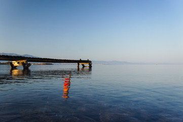 Fototapeta na wymiar a pier in the sea of ​​aegean in summer