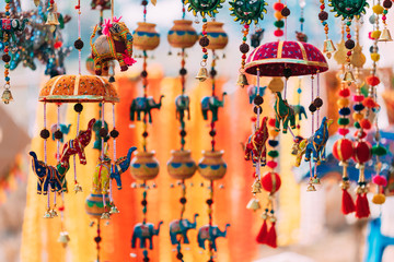Goa, India. Set Of Small Miniature Indian Elephant Toys And Bells At Local Goa Market. Popular Souvenirs From India - obrazy, fototapety, plakaty