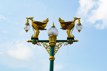 Fototapeta na wymiar street lamp thai art 2 gold bird style