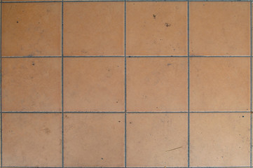 dirty brown tile floor background