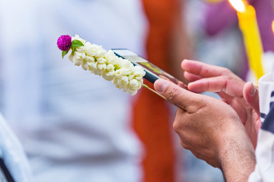 Close Up Of A Woman Holding  Offering Flowers In Siem Reap 