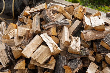 Pile of firewood in different sizes 