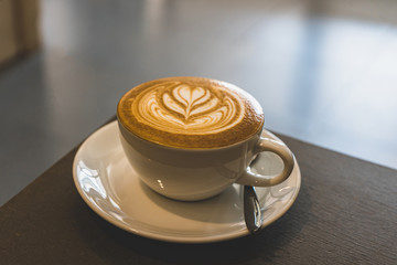 A cup of cappucino in coffee shop.