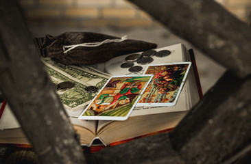 Ritual and spell for attracting money, pagan magic and fate prediction, work of witch, occultism concept