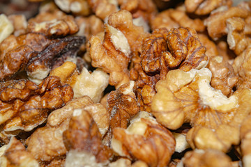 Peeled walnuts close-up. Surface texture. Healthy diet.