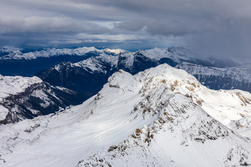 Snow capped mountains in Switzerland in winter.