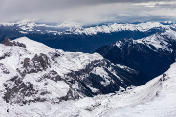 Snow capped mountains in Switzerland in winter.