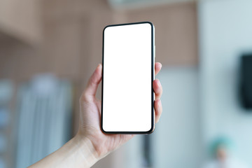 Woman hand showing smart phone blank screen.
