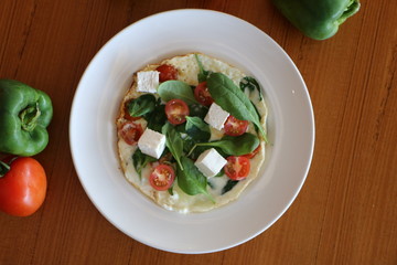 Egg white omelet, Egg white omelet filled with baby spinach,
cherry tomato, feta cheese and protein bread