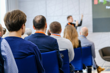 Fototapeta premium Audience listens lecturer at workshop