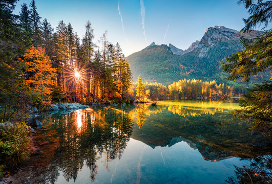 Majestic autumn view of Hintersee lake with Hochkalter peak on background, Germany, Europe. Gorgeous morning view of Bavarian Alps. Beauty of nature concept background.