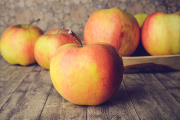 apples on wooden table