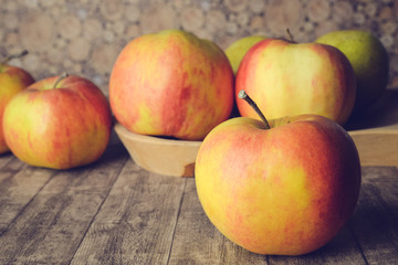 apples on wooden table