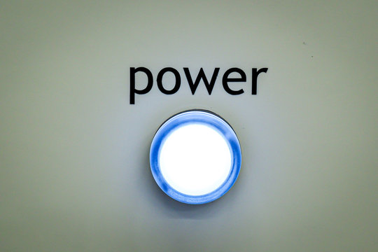 Big Blue Button With An Inscription 