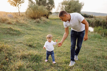 Fototapeta premium Happy family outdoors spending time together