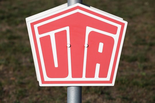 Gyhum, Germany - July 22, 2018: UTA logo on a panel. UTA fuel card are amongst the leading issuers of fuel and service cards for commercial goods transport and transportation 