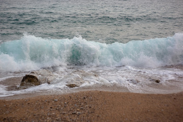sea waves in the adriatic sea and the beach