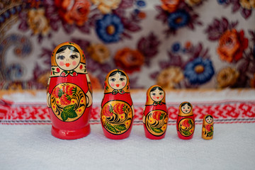 painted nesting dolls on a bright background