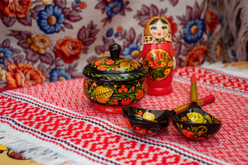 painted nesting dolls on a bright background