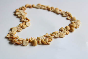 Nuts arranged in heart shape with concept of healthy eating