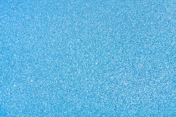 Fototapeta premium Colorful abstract blurred light blue background, blue glitter christmas texture