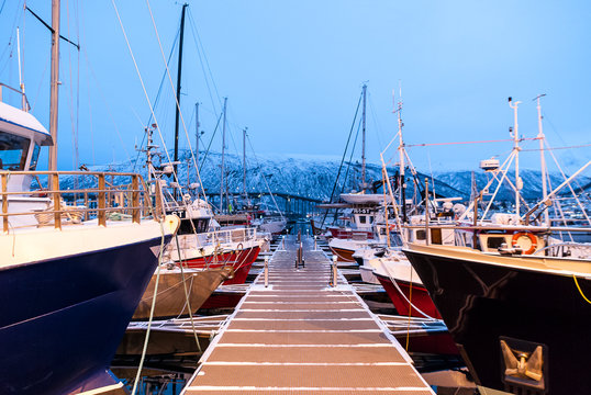 Jetty with boats moored at the port of Tromsø