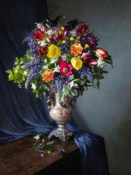 Still life with bouquet of flowers in a vase