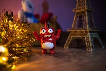 DIY Eiffel tower in the room lit with Christmas lights