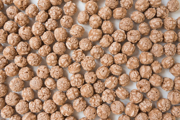 Breakfast balls, top view. background, texture. Beige shades.