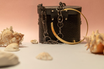 Beautiful necklaces are laid with shells. Costume jewelry is perfectly harmonises with pink color....