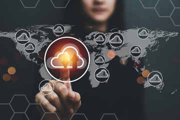 Concept of business women, hands on technology, digital data storage Cloud technology and data exchange around the world.