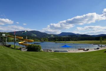 Beautiful landscape, lake and mountains of the Alps in Austria. Rest for tourists.