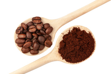 Coffee beans and ground coffee on spoons