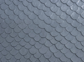 Gray color fish scale mortar plastering pattern on skin of wall vintage  © Arunee
