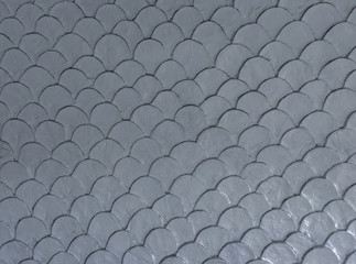 Gray fish scale mortar plaster pattern of wallpaper in vintage style