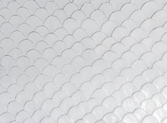 white fish scale mortar plaster pattern of wallpaper vintage style © Arunee