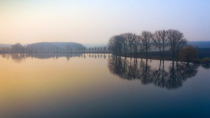 Morning summer landscape over the lake. Drone view.