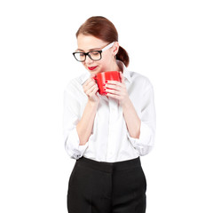 Business woman, isolated on white background. Office Style. A woman in a white shirt with red lipstick and a red cup in hand. coffee break