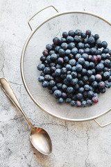 A bowl with fresh ripe blueberry