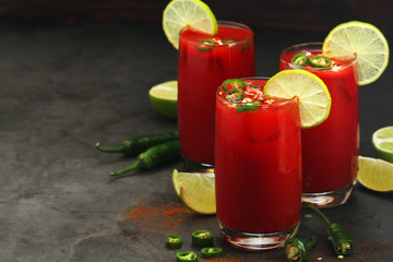 Jalapeno tomato margarita cocktail with lime	