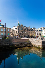 Fototapeta na wymiar Alesund, Norway - June 2019: Great summer view of Alesund port town on the west coast of Norway, at the entrance to the Geirangerfjord. Old architecture of Alesund town in city centre.