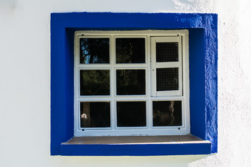Vintage blue square window. Architecture