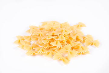 Raw Farfalle pasta on a white background