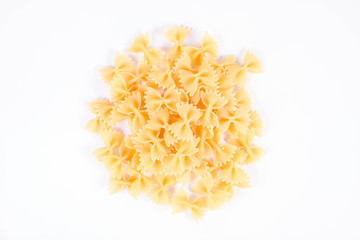 Raw Farfalle pasta on a white background
