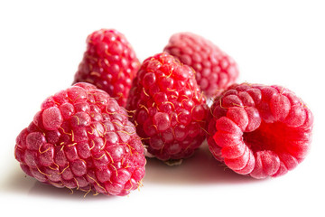 Fresh ripe raspberries on a white background. Close-up.
