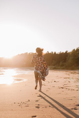 woman walking on beach