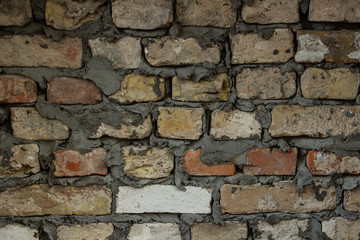 brick wall background, place for text, colors - gray, orange, red