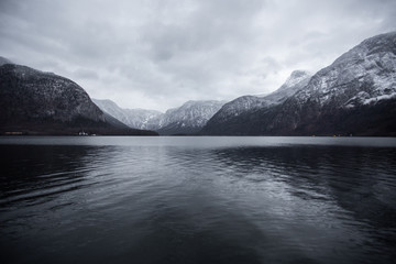 Scenic morning view on famous mountain town Hallstatt and Hallstatter Lake in the Austrian Alps. Location place: Hallstatt, Salzkammergut, Austria surrounded by Dachstein Alps. Nature concept