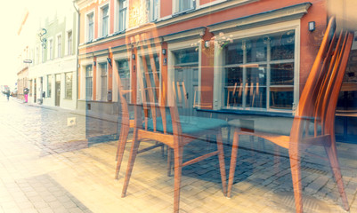Empty cafe in the center of old RigaBeautiful vintage chairs in an empty cafe in the center of old Riga