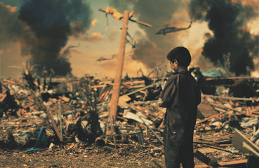 Homeless child crying for his family / Military soldiers killed her family and they destroyed their houses